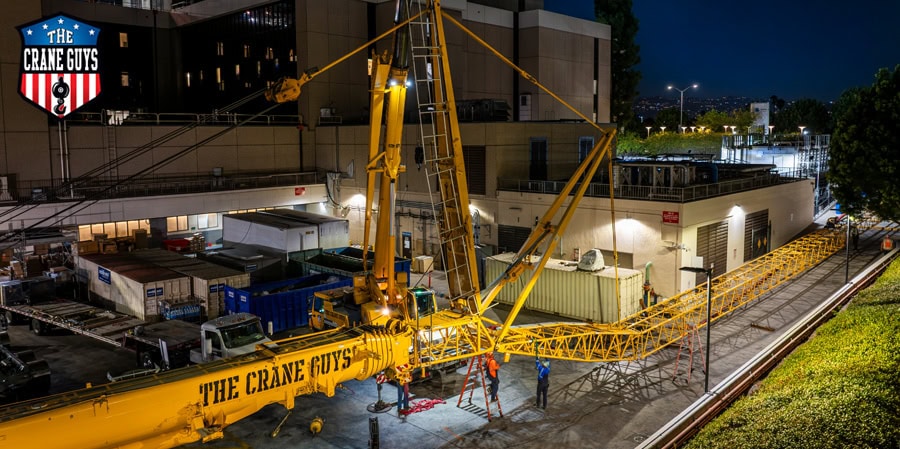 crane guys planning crane assembly in restricted work area